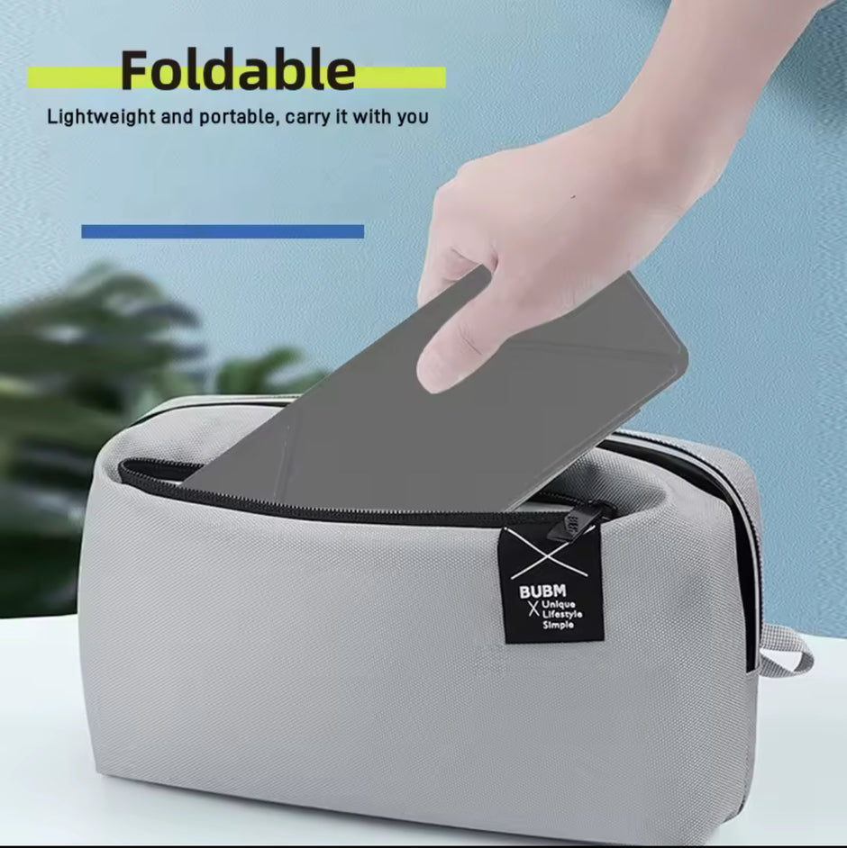 Foldable pouch being used to carry a tablet, with text highlighting its lightweight and portable nature.